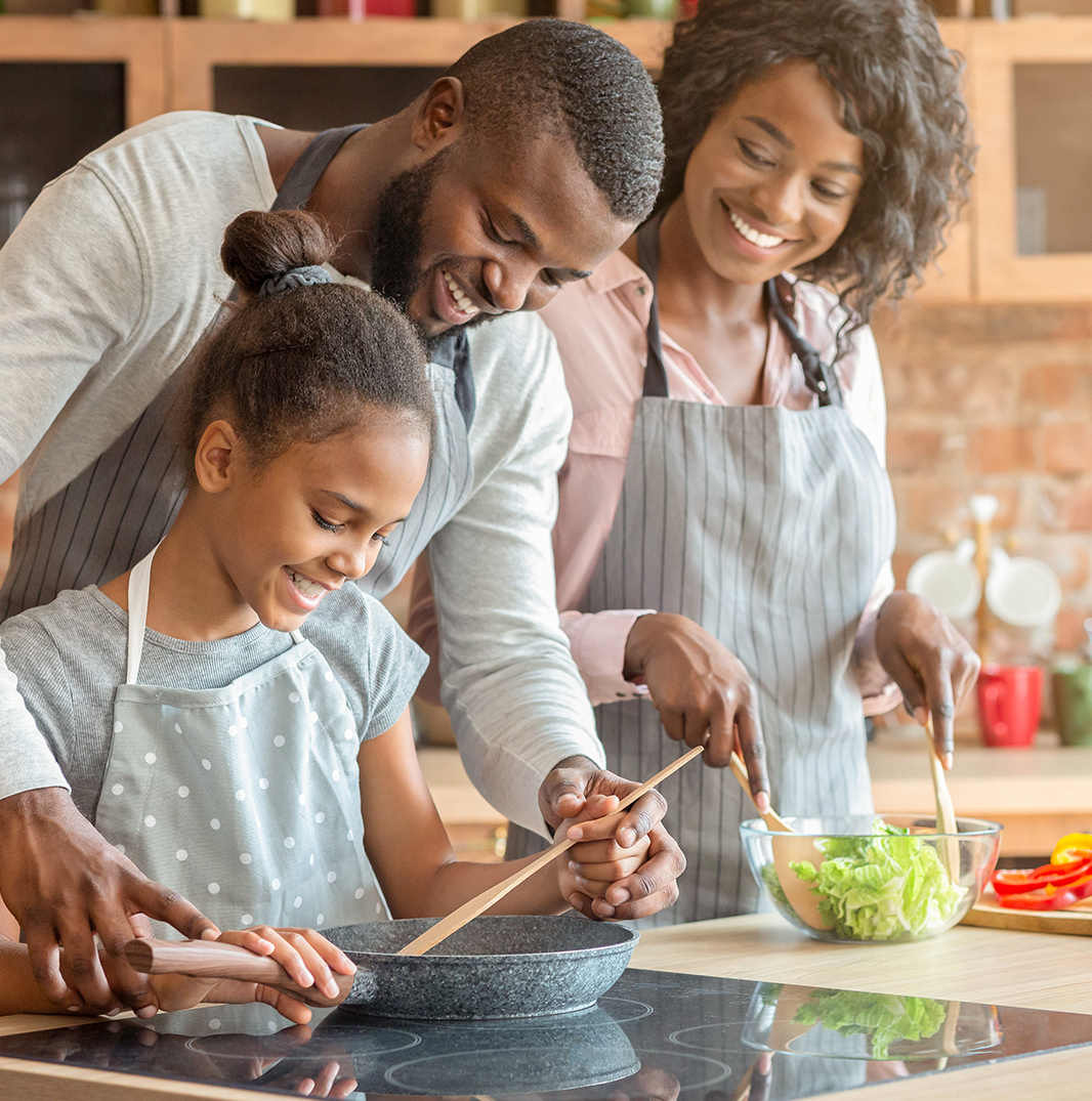 Father and child baking together